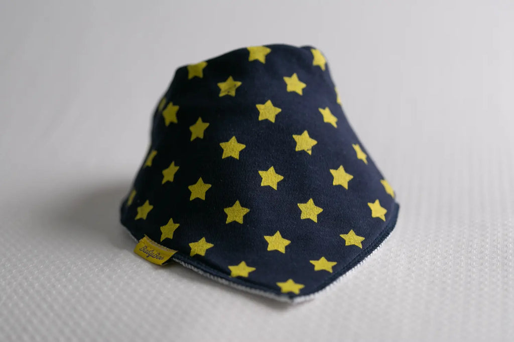 Navy with yellow stars organic cotton DribbleBoo bandana bib